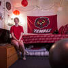 Student sitting in dorm room